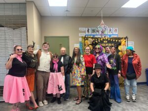 Asheville facility employees who dressed up for the Decade Day event.