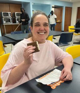 A Winston-Salem facility employee enjoys ice cream at the 90th anniversary ice cream event.
