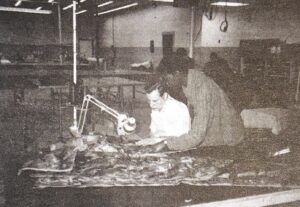 Two IFB employees work at the Asheville facility in the 1990s.