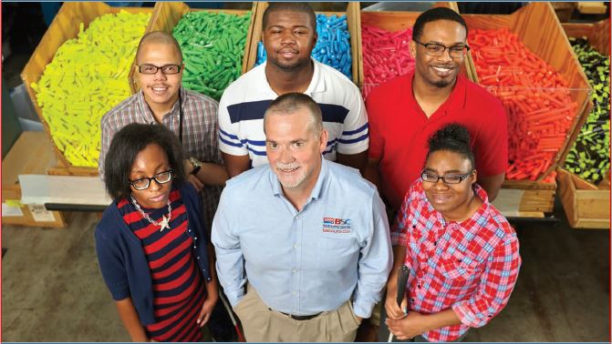 David Horton stands with five IFB employees who were previously SEE students in A Brighter Path Programs