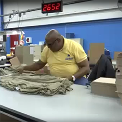 Man working on T Shirts