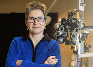 Dr. Susan Wise, facing camera wearing glasses