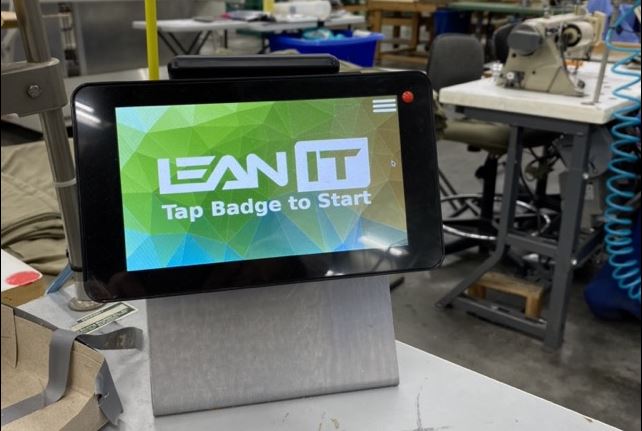 Image of the LeanIT terminal at a t-shirt sewing workstation. 
