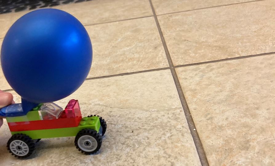 Lego car with balloon on top