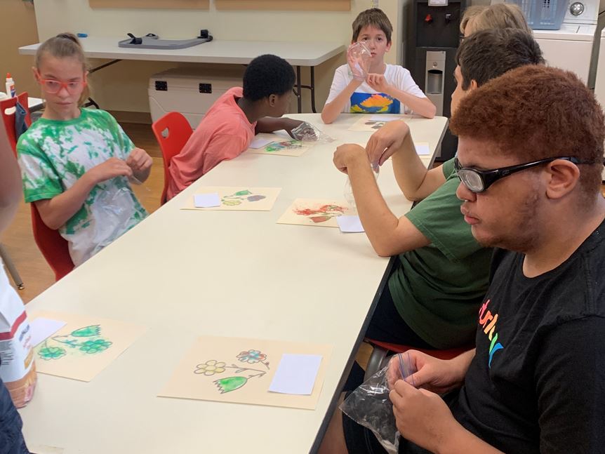 S.E.E. Campers work on their flowers traced with jello project
