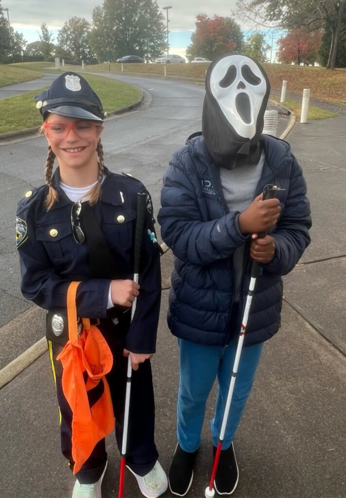 S.E.E. students in their costumes trick-or-treat