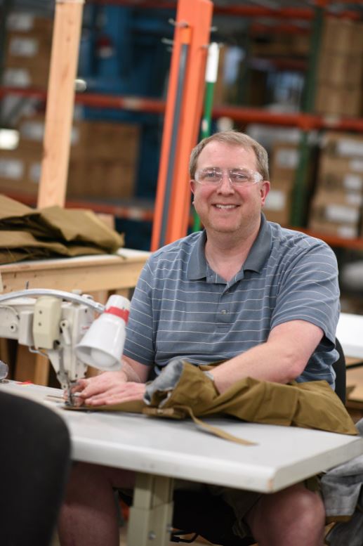 Joshua Denton at his workstation