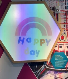 This picture expresses our feelings in this place of wonders. Picture – a projection of a rainbow with the words “Happy day” underneath