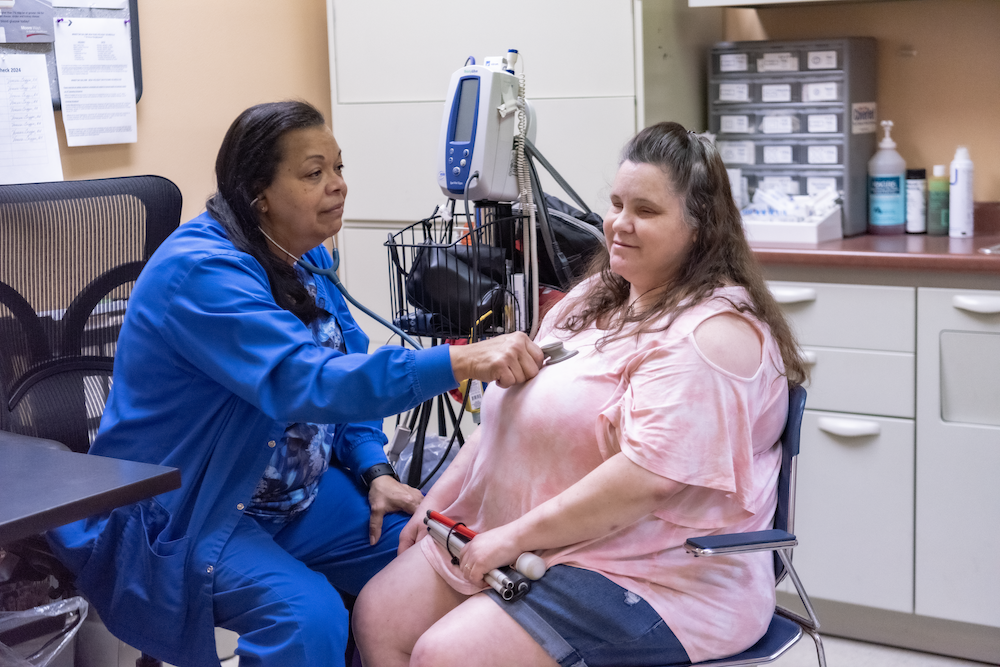 Employee Tammy Moore at IFB Solutions' on-site health clinic.