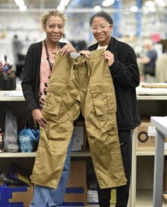 Trainers pose with FHS pants