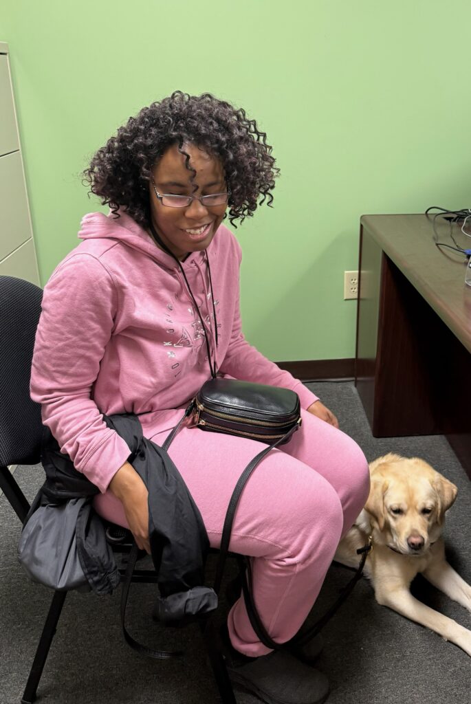 Akiva and her guide dog, Wendy