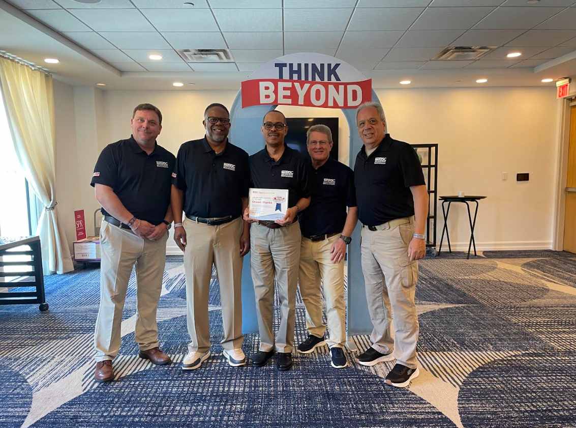 Shawn Blanks holding the 2026 Manager of the Year Award